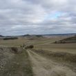 SS 2017 43 Panorama, con nubes sobre Dueñas, en la bajada.
